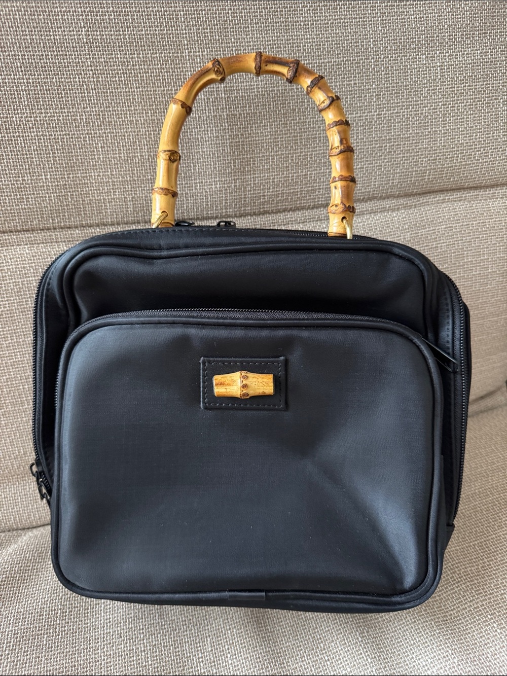 Black Leather Top-Handle Bag with Bamboo Accent